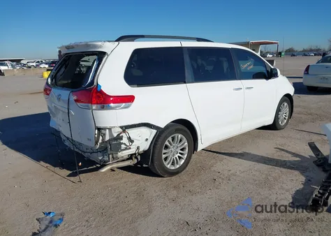 2014 Toyota Sienna Xle V6 8 Passenger z USA, uszkodzony, nr VIN 5TDYK3DC6ES487258